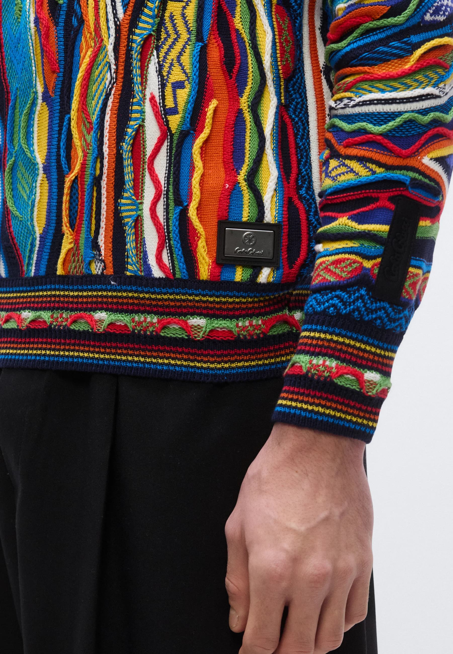 Close-up of the cuff with the Carlo Colucci brand patch.